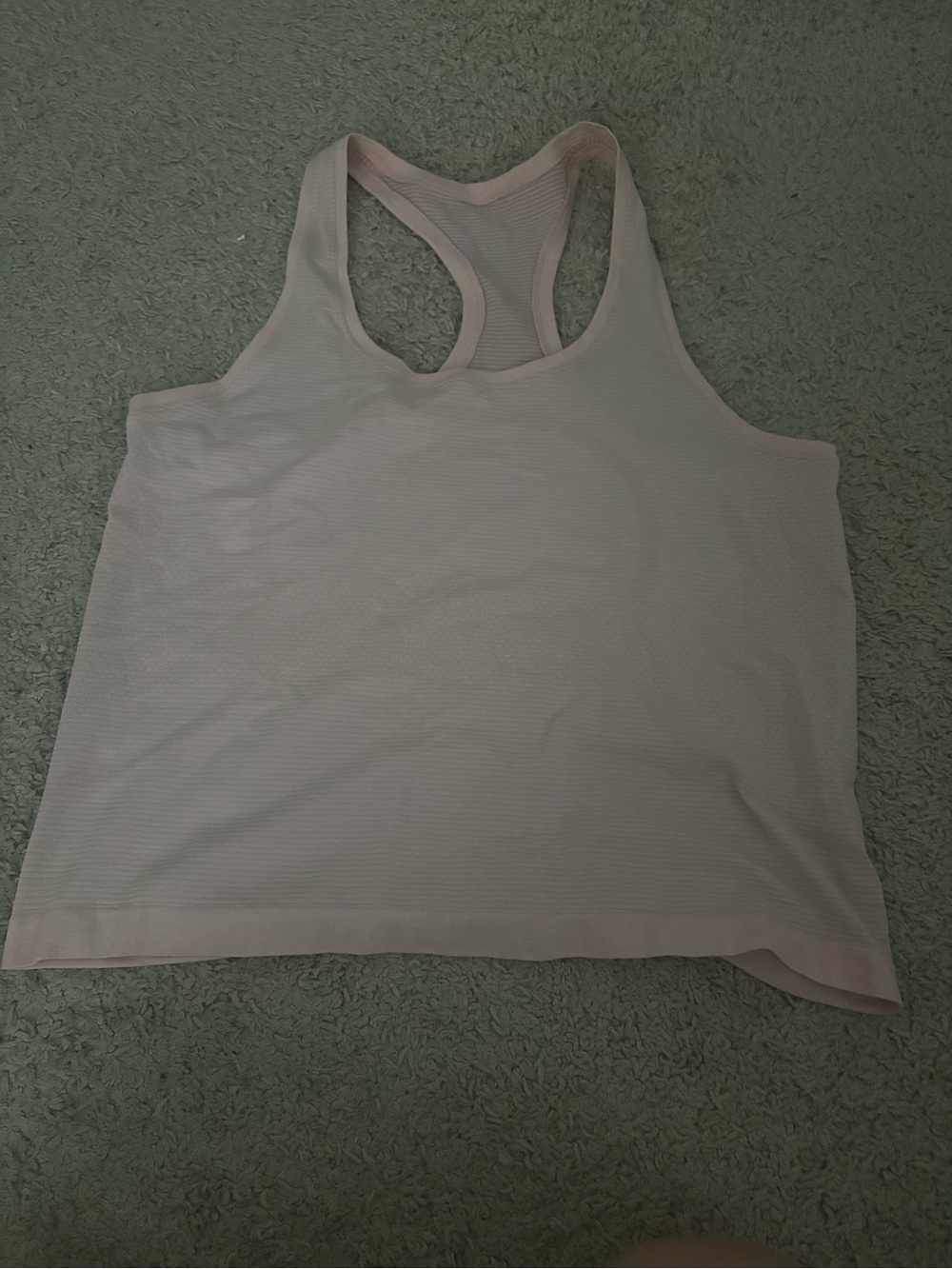 Light pink lululemon racer back swiftly tech tank top *waist length*